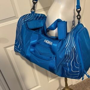 Hoka Vibrant Blue Duffel Bag with White Accents